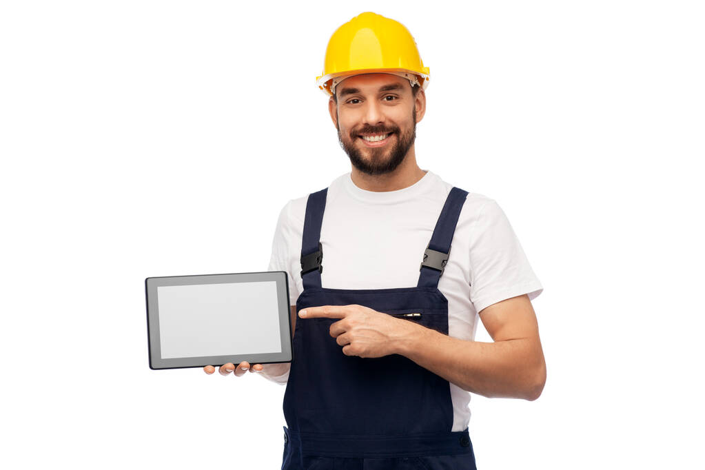 χαρούμενος εργάτης ή οικοδόμος με tablet υπολογιστή - Φωτογραφία, εικόνα