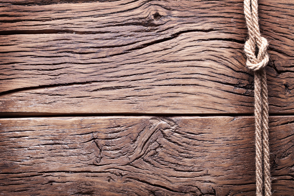 Sailor's knoop op oude houten achtergrond. - Foto, afbeelding
