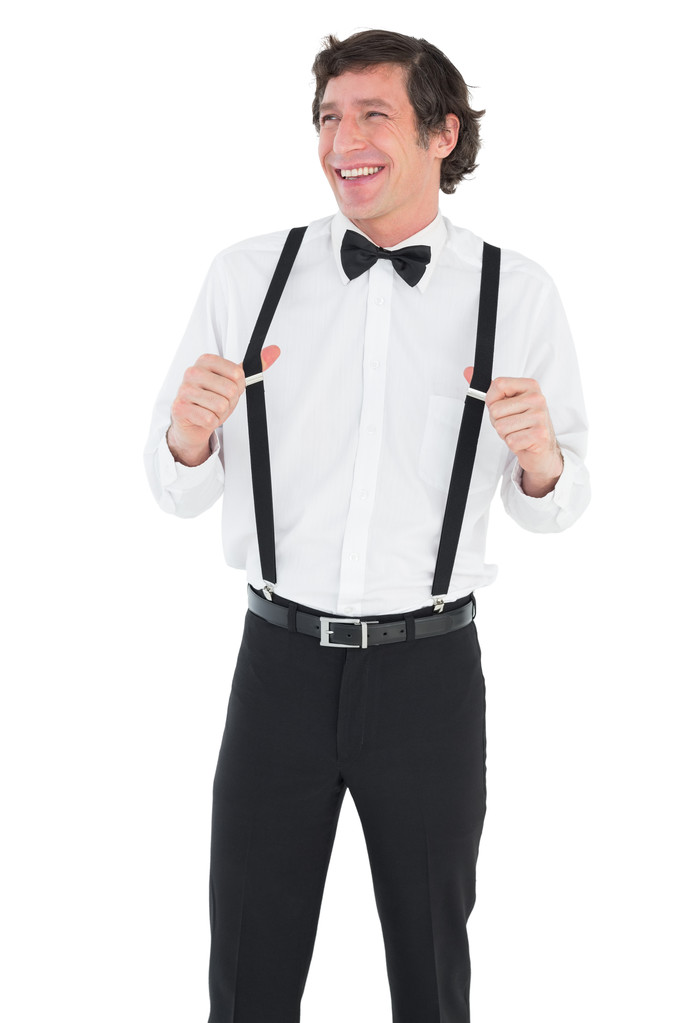 glücklicher Mann streckt Hosenträger - Foto, Bild