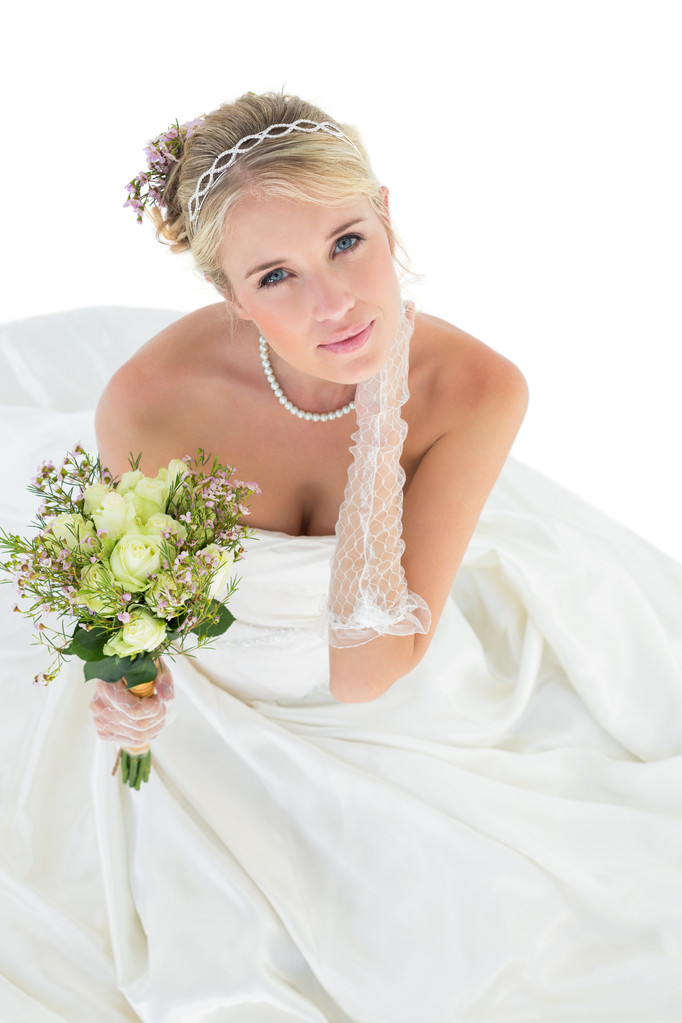 Retrato de novia sensual sosteniendo ramo de flores
 - Foto, Imagen