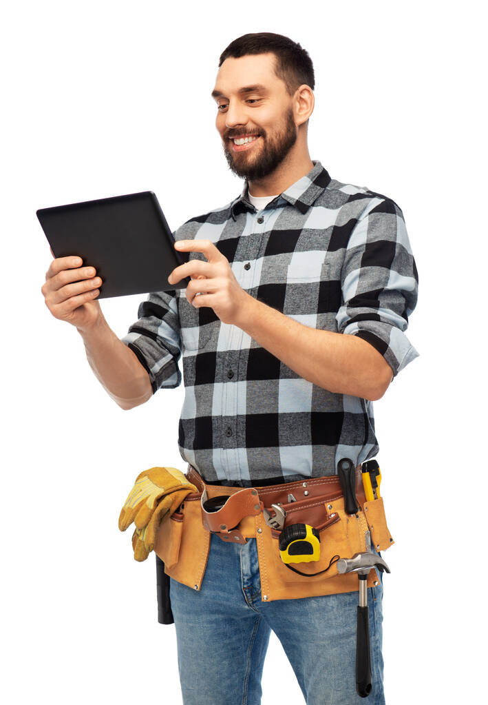 constructor feliz con Tablet PC y herramientas - Foto, Imagen