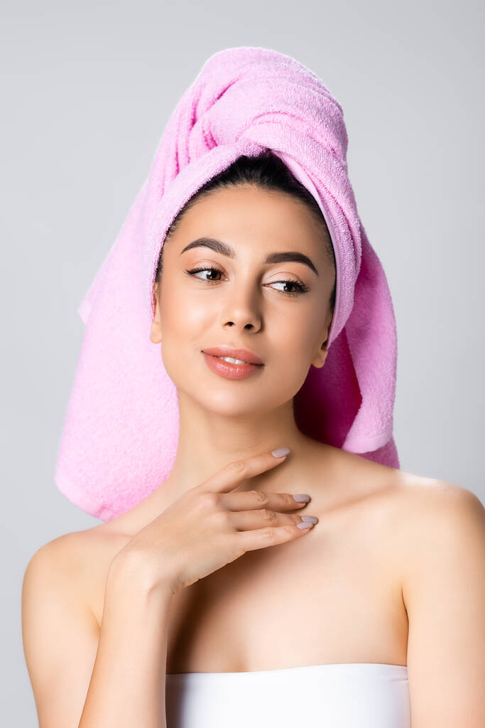 beautiful woman with towel on hair isolated on grey - Photo, Image