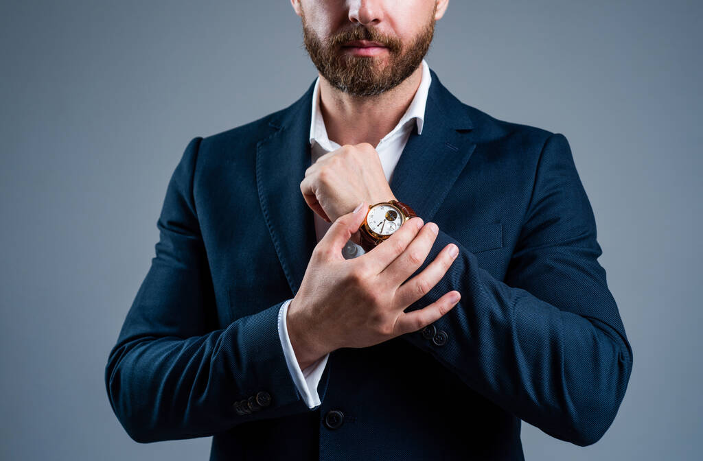 ceo man in jacket with groomed beard hair show hand watch, accessory - Photo, Image