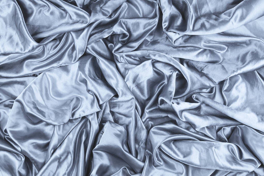 Texture o sfondo di tessuto di seta. Tessuto argentato - Foto, immagini
