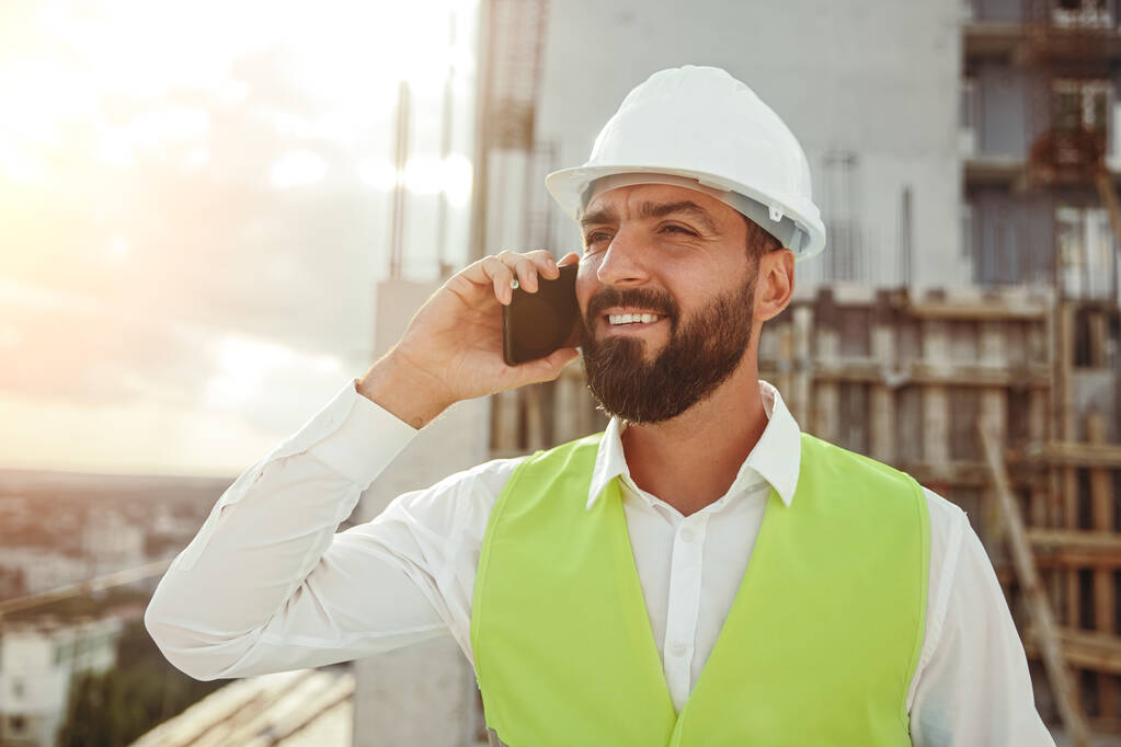 Construction worker making phone call - Photo, Image