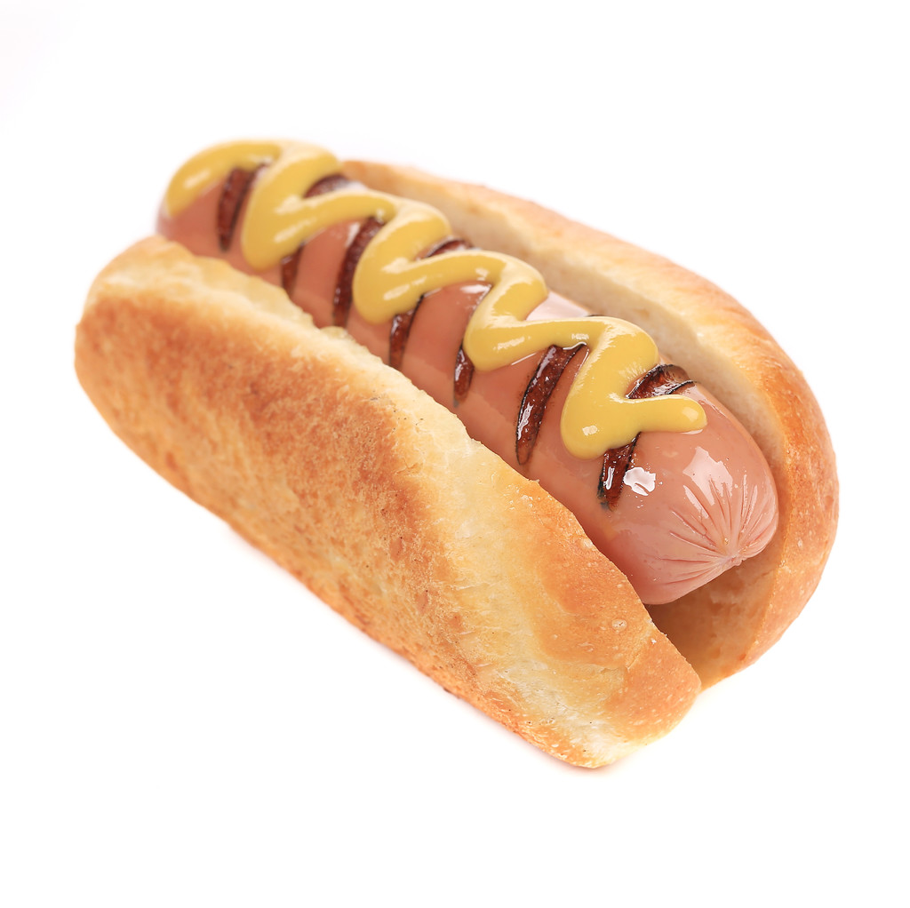 ízletes sült hotdog mustárral. - Fotó, kép