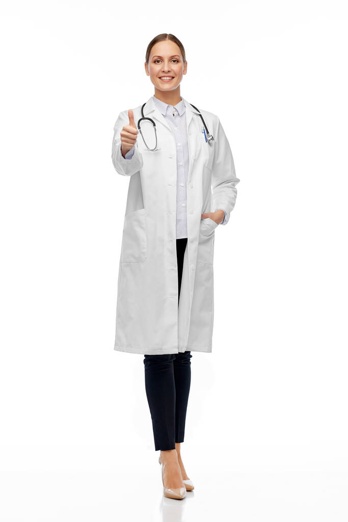 uśmiechnięta kobieta lekarz pokazując kciuki w górę - Zdjęcie, obraz