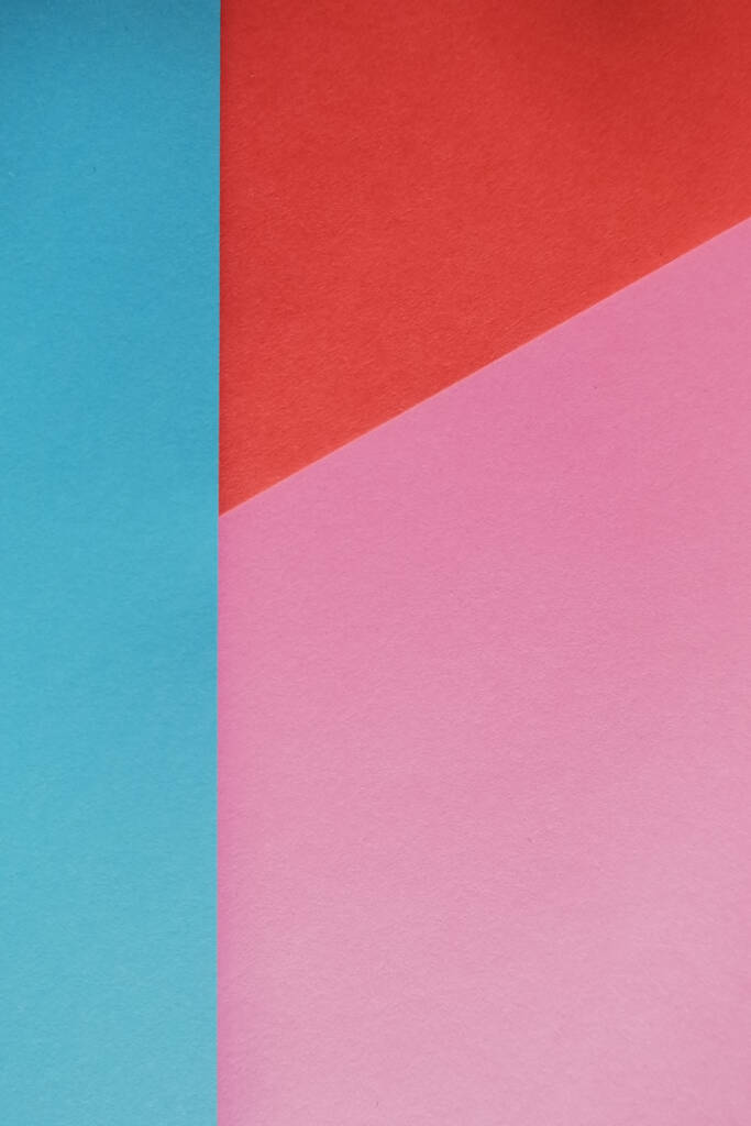 Ένα κατακόρυφο γεωμετρικό φόντο φτιαγμένο με χρωματιστά χαρτιά - αντιγραφή χώρου - Φωτογραφία, εικόνα