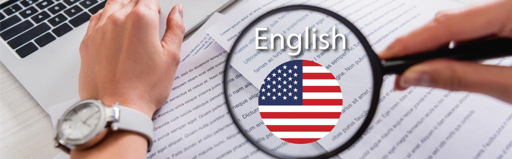 partial view of interpreter holding magnifier near document, english lettering and icon with usa flag illustration, banner - Photo, Image