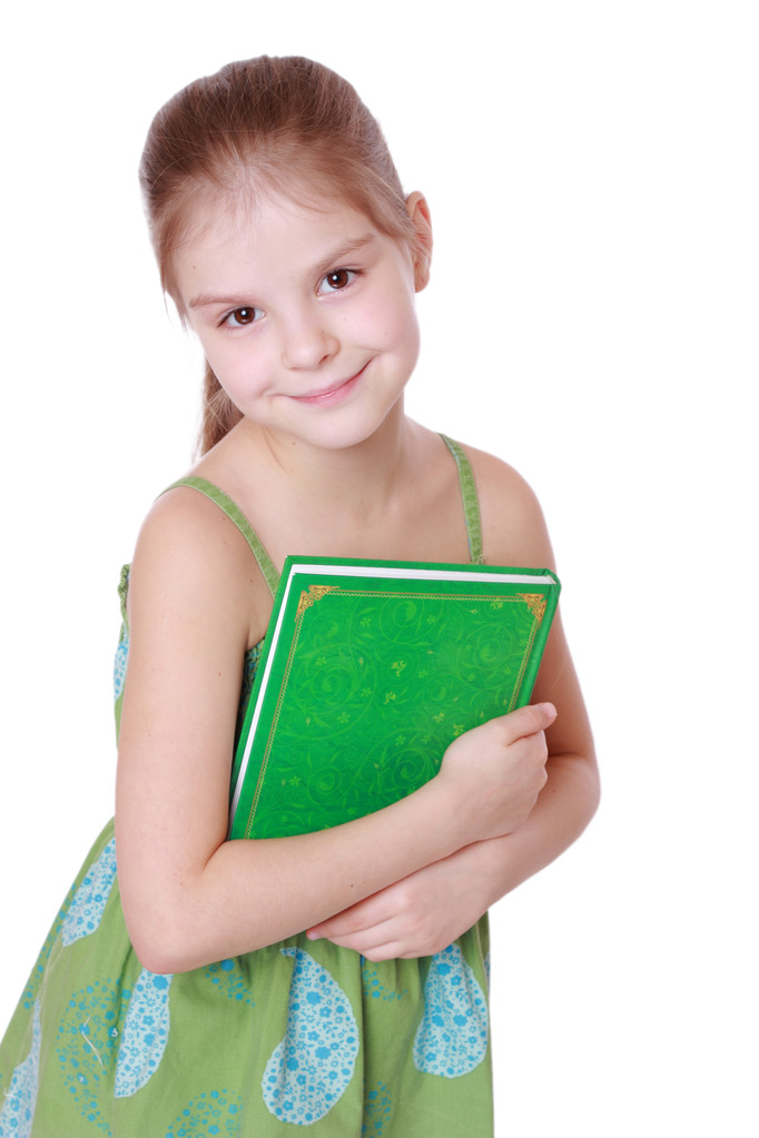Tyttö tilalla vihreä iso kirja
 - Valokuva, kuva