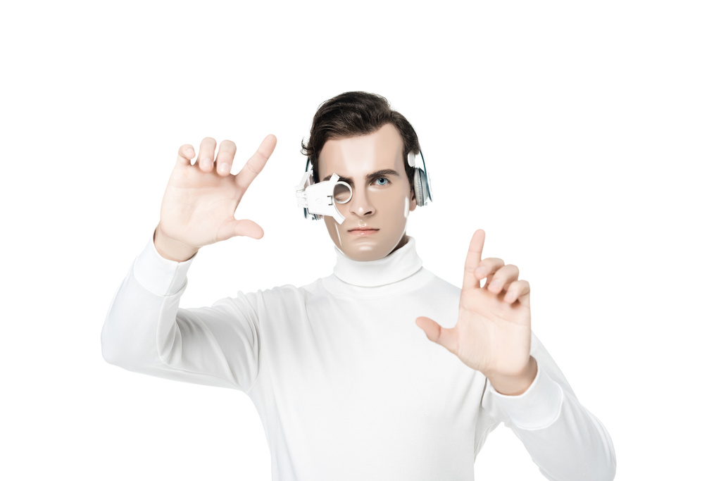 Cyborg σε ακουστικά και φακό των ματιών αγγίζοντας κάτι που απομονώνονται σε λευκό - Φωτογραφία, εικόνα