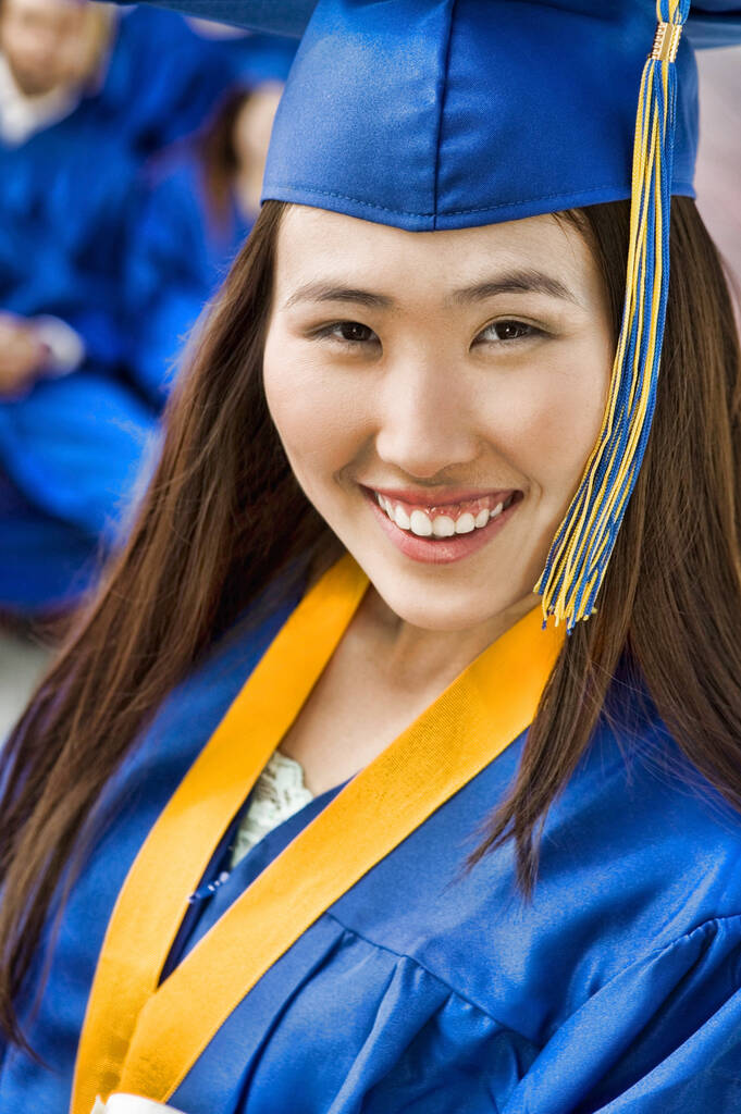 Phtoo of young attractive chinese graduate in ceremony - Photo, Image