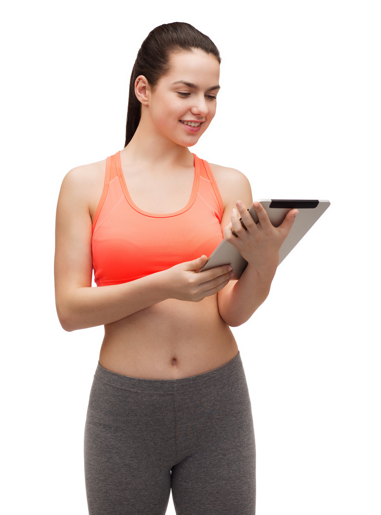 Sporty woman with tablet pc computer - Photo, Image