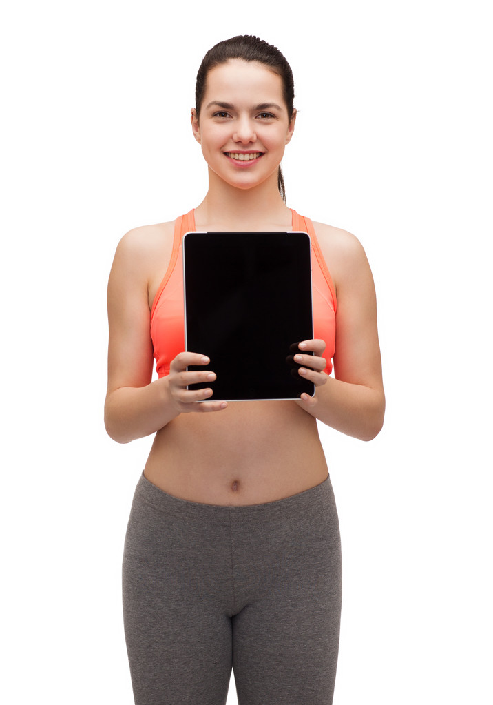 sportliche Frau mit leerem Bildschirm am Tablet-PC - Foto, Bild