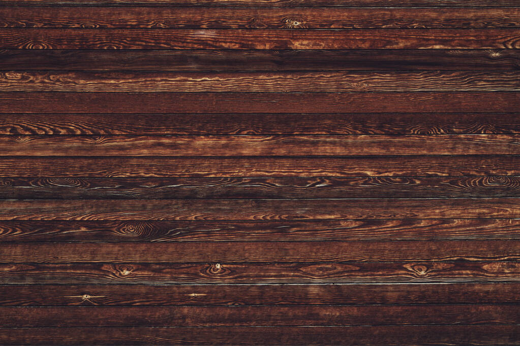 Braune Holzdielen als Hintergrund, abgenutztes Muster aus Pinienholzplatten - Foto, Bild