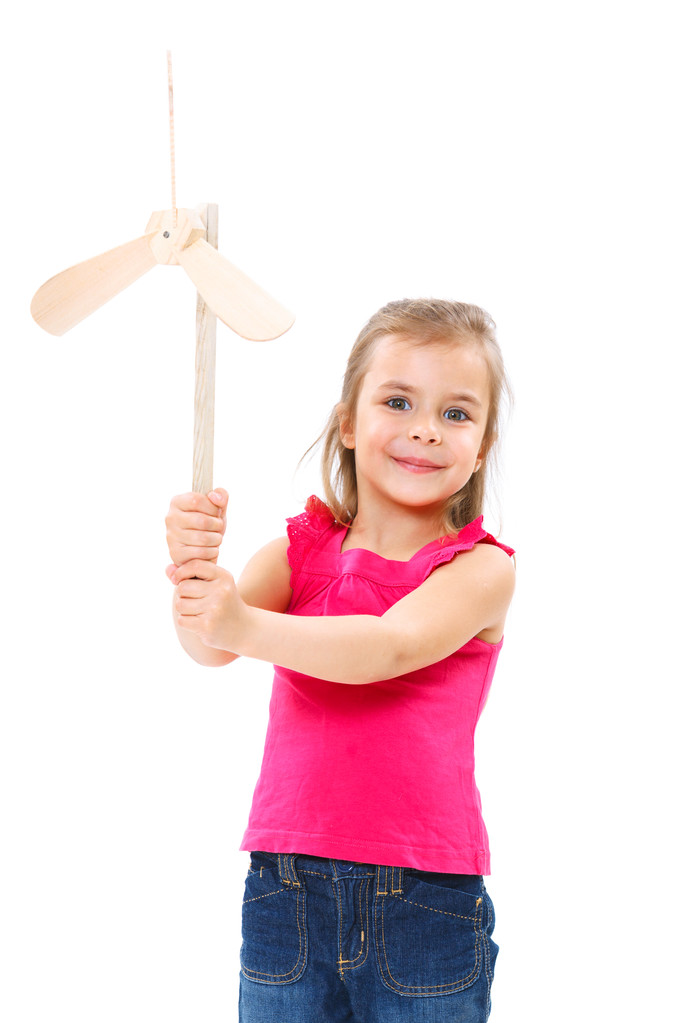Niño con juguete molino de viento
 - Foto, imagen