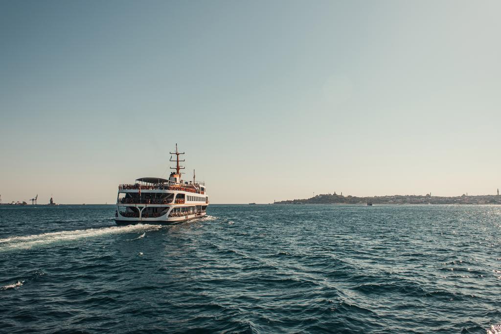 floating touristic ship in Bosphorus strait  - Photo, Image