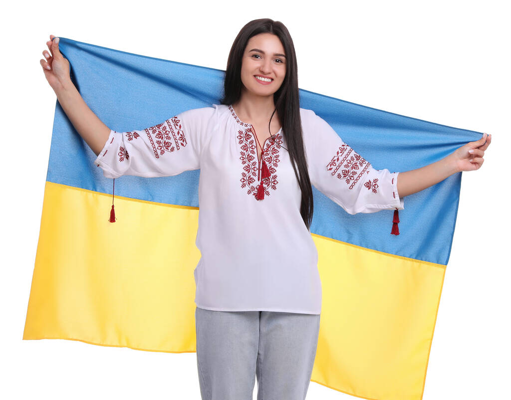 Mladá žena s vlajkou Ukrajiny na bílém pozadí - Fotografie, Obrázek