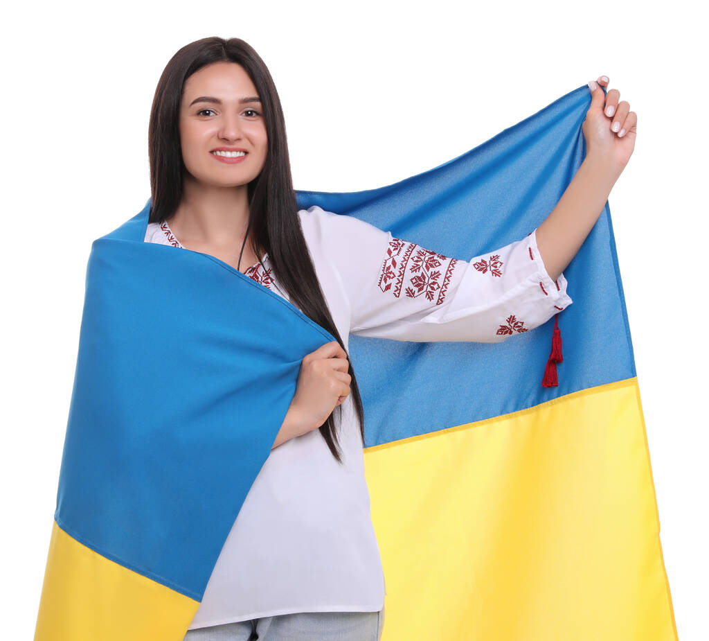 白い背景にウクライナの旗を持つ若い女性 - 写真・画像