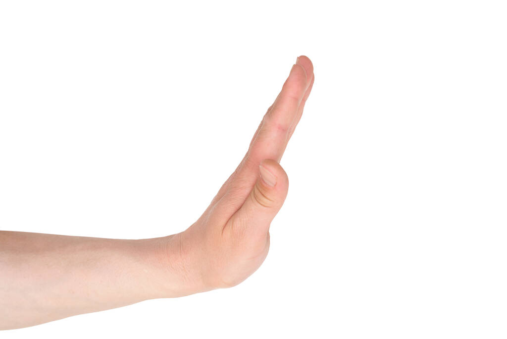 Зупинити жест за жіночою рукою ізольовано на білому тлі
. - Фото, зображення