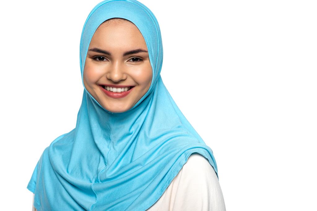 Muslim woman in hijab smiling at camera isolated on white  - Photo, Image