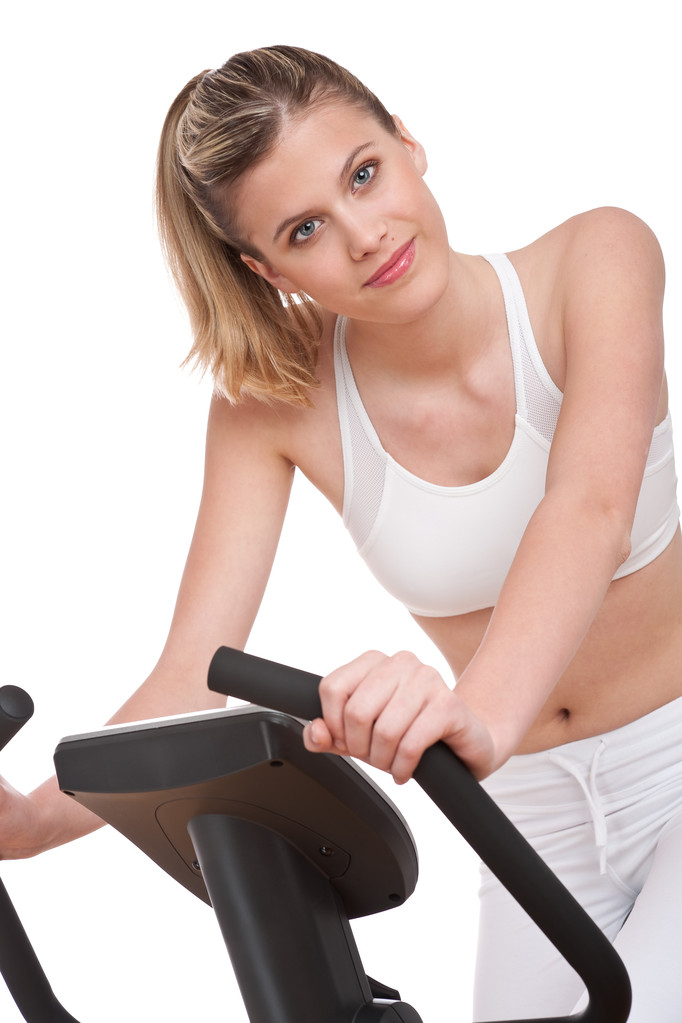 řady fitness - žena s cvičení kolo na bílém pozadí - Fotografie, Obrázek