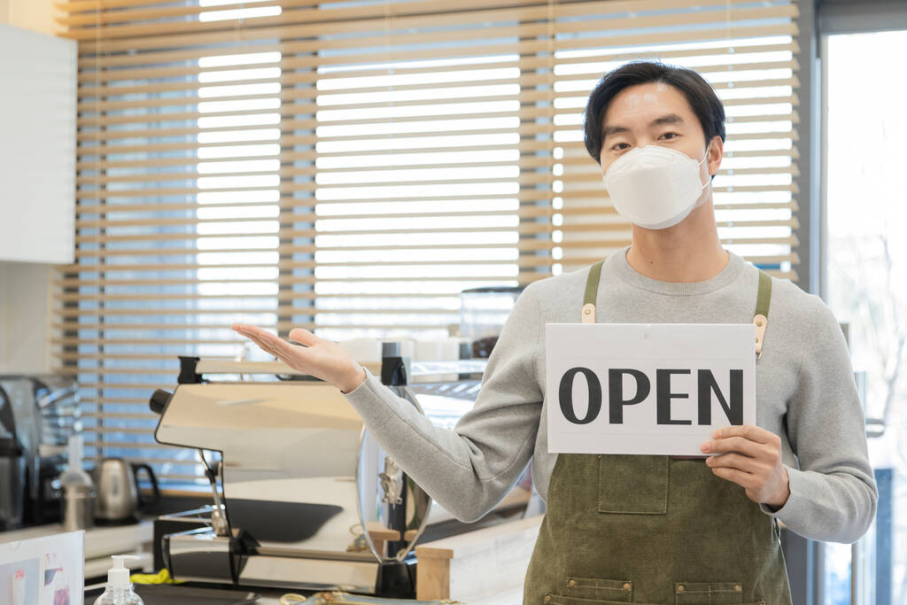 store open sign at store door, business during covid with mask - Photo, Image
