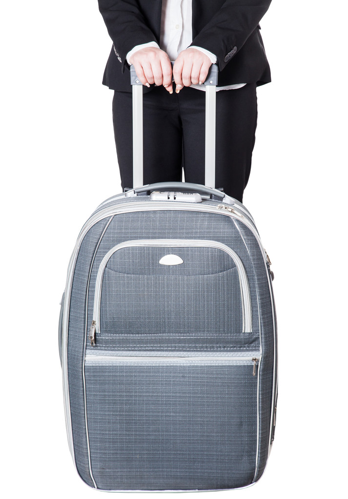 женщина с чемоданом - Фото, изображение