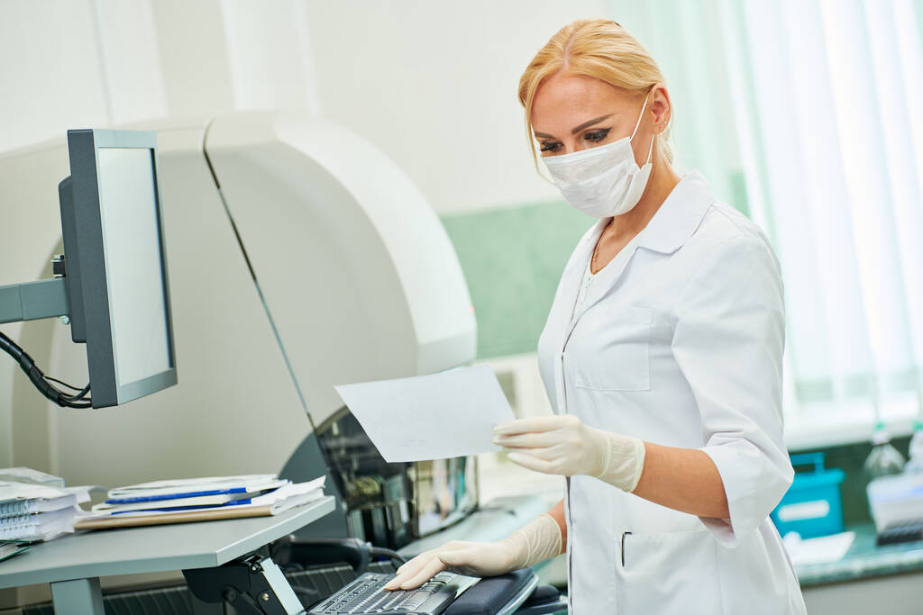 Medical analysis worker in clinic laboratory. - Photo, Image