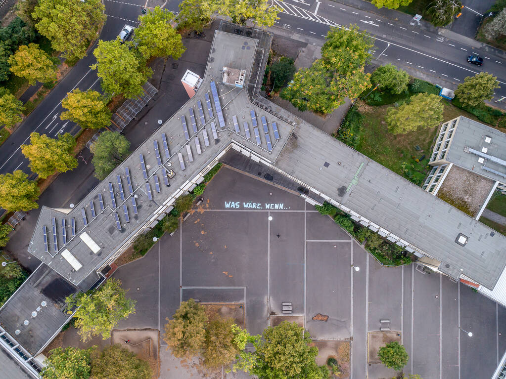 Friedrich Ebert Gymnasium Schoolyard text saying what if in federal government district aerial view Bonn city Germany - Photo, Image