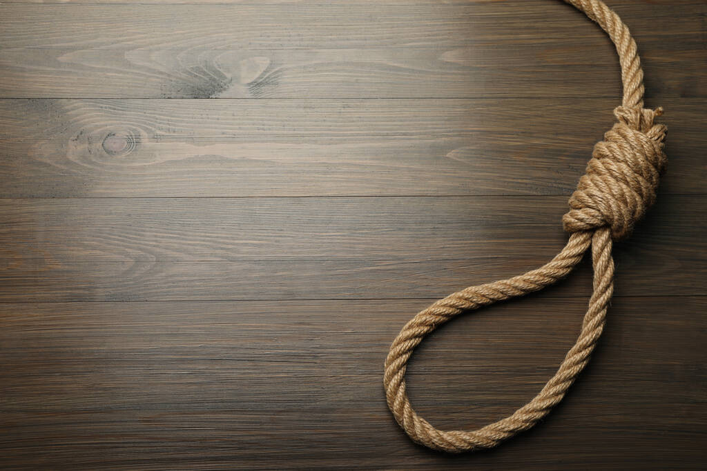 Rope noose on wooden table, top view. Space for text - Photo, Image