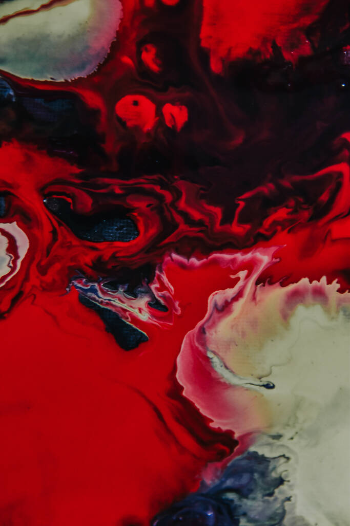 Una pintura abstracta con colores mixtos de pintura al óleo rojo y negro - ideal para papel pintado - Foto, imagen