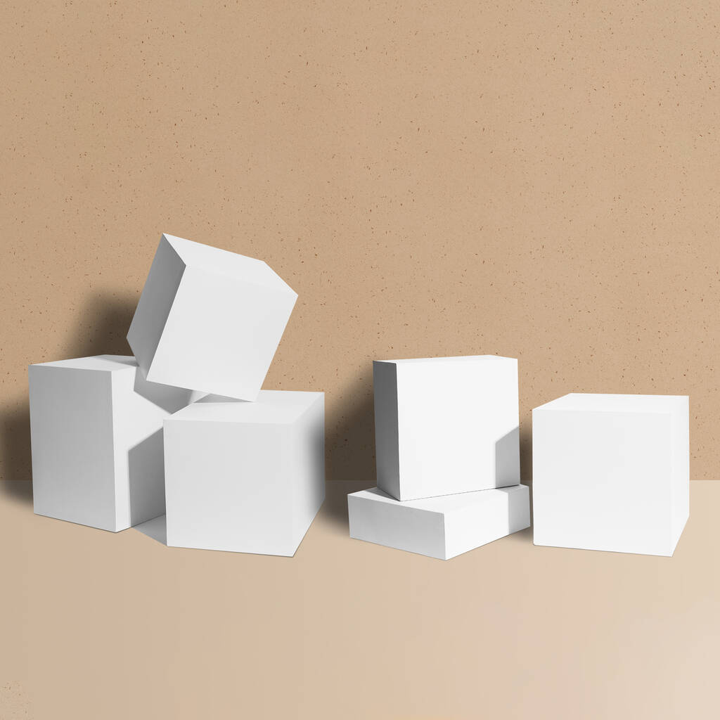 Ein 3D-Rendering weißer, leerer Würfel mit Mockup vor braunem Hintergrund - Foto, Bild