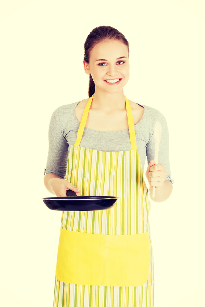 Jeune femme cuisine des aliments sains
 - Photo, image
