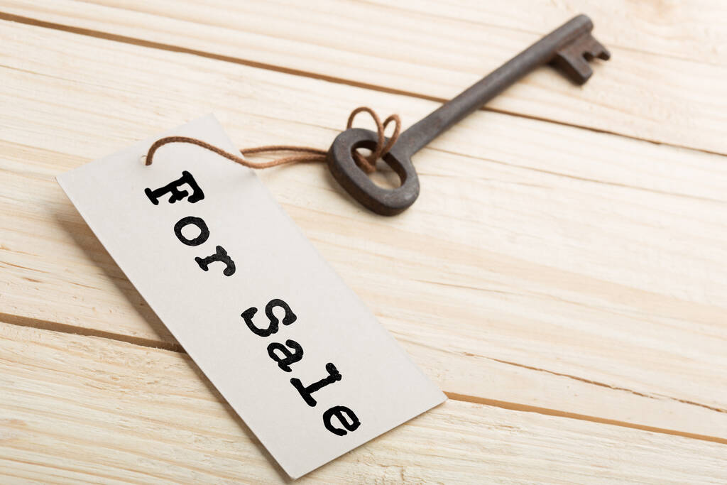 Immobilienleasingkonzept - alter Schlüssel mit Etikett - Foto, Bild
