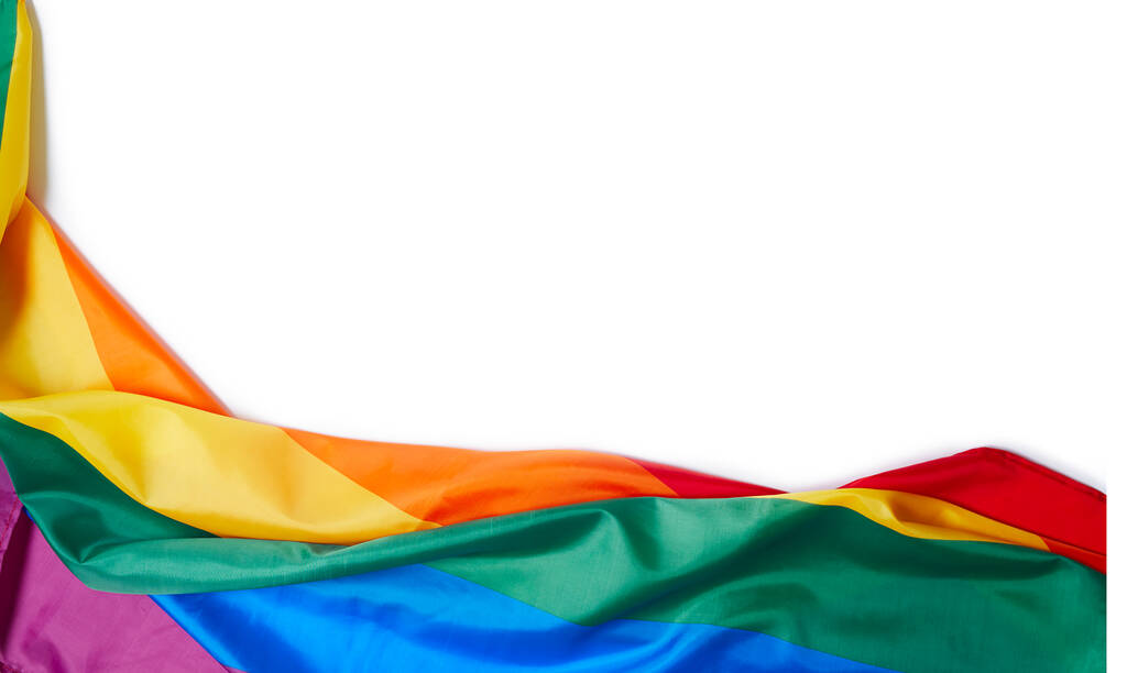Progreso Bandera arco iris LGBTQ aislada sobre fondo blanco. Bandera en la esquina. Concepto de libertad y amor. El mes del orgullo. activismo, comunidad y libertad Concepto. Copiar espacio.. - Foto, imagen