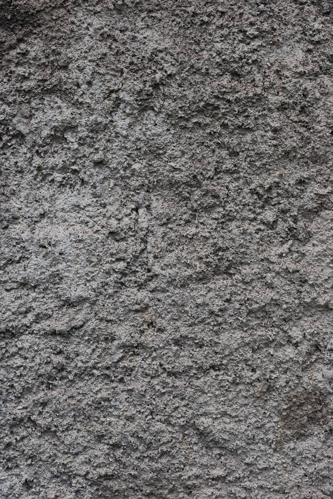 Textura de la superficie de la pared de yeso rugoso primario primer plano. - Foto, imagen