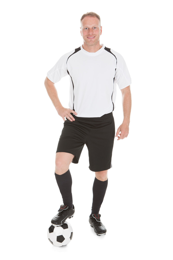 サッカー ボールの上に脚を持つプレーヤー - 写真・画像