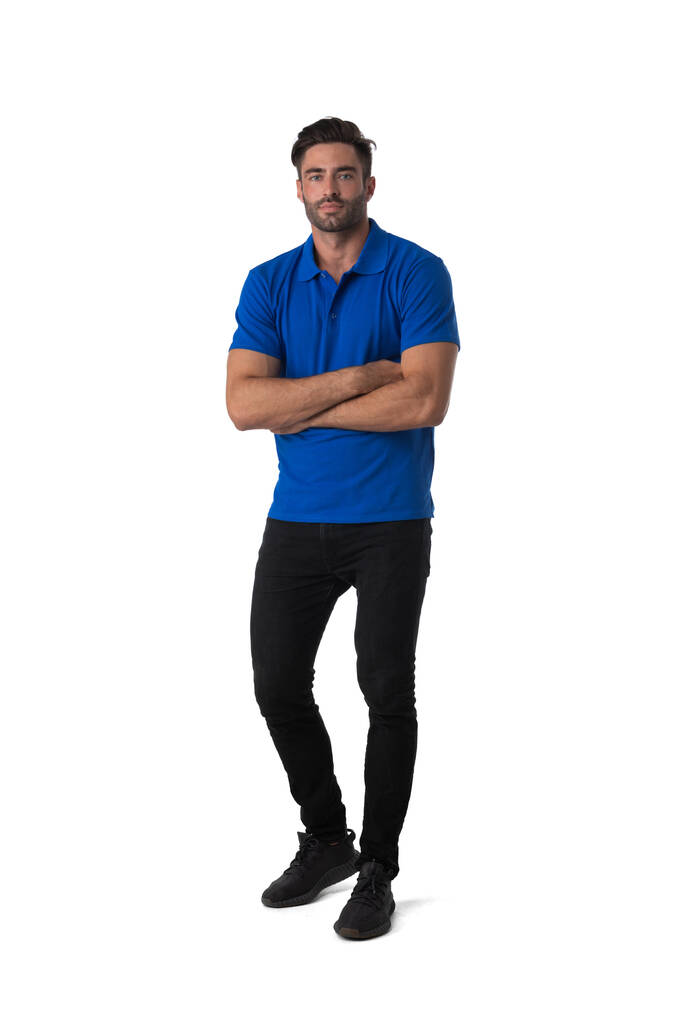 Full length casual portrait of handsome tall young man standing with arms folded isolated on white background - Photo, Image