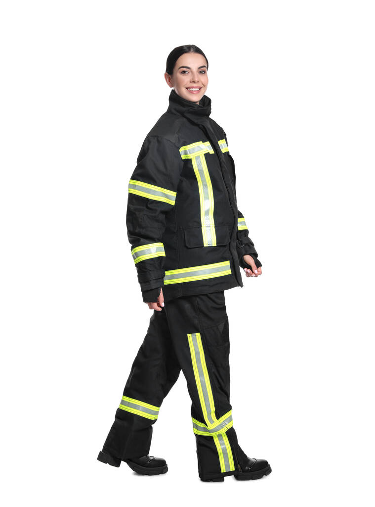 Portrait complet de pompier en uniforme sur fond blanc - Photo, image