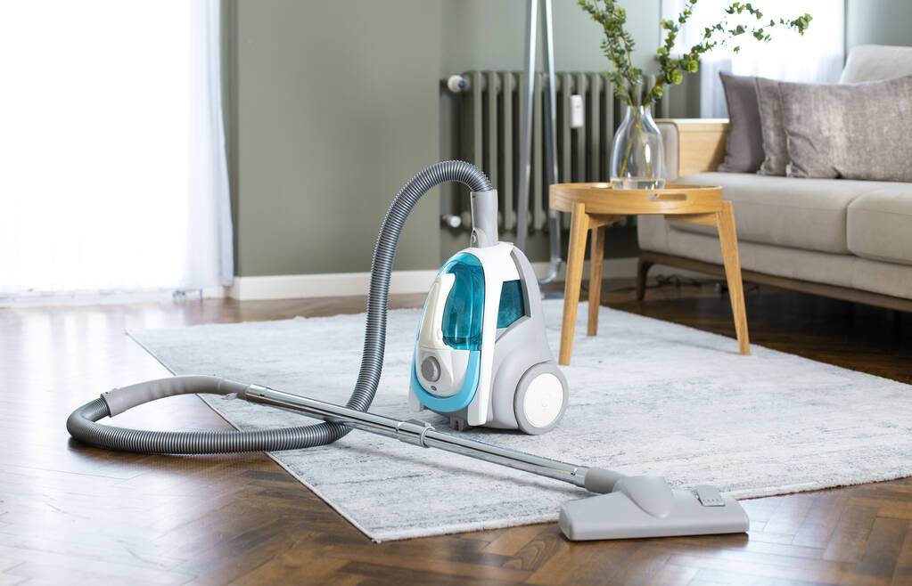 Vacuum cleaner in living room at home - Photo, Image