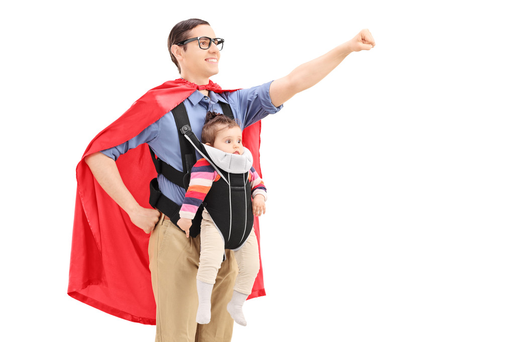 Male superhero carrying baby - Photo, Image