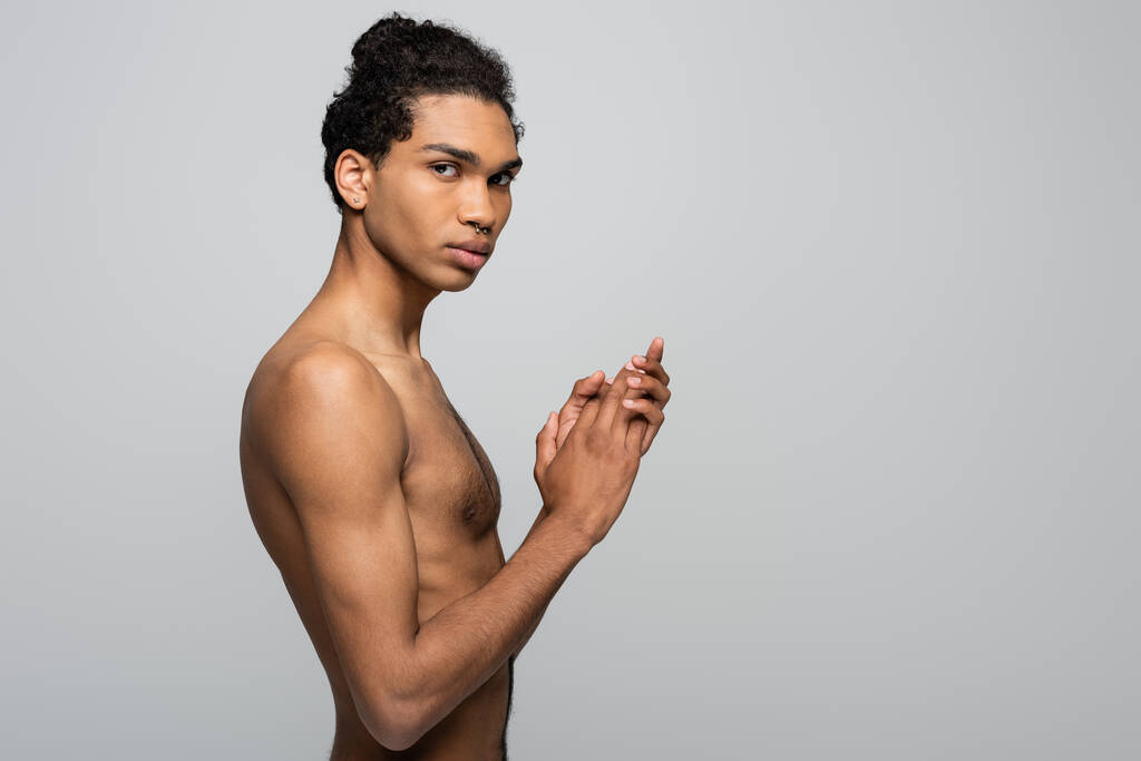 shirtless african american man with perfect skin looking at camera while standing isolated on grey, beauty concept - Photo, Image
