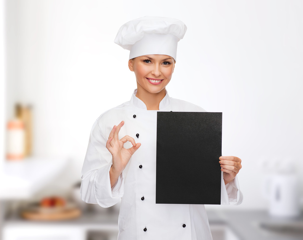 uśmiechnięta kobieta kucharz z czarnego papieru puste - Zdjęcie, obraz