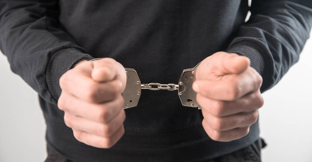 young sad man hand handcuff - Photo, Image