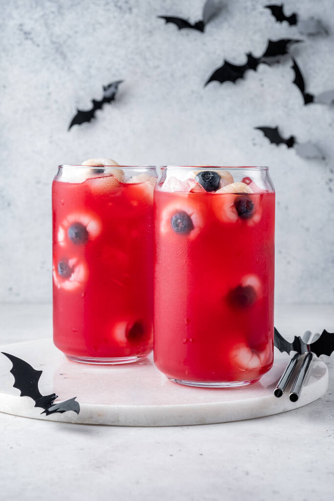 Red halloween cocktail with eyeballs - Photo, Image