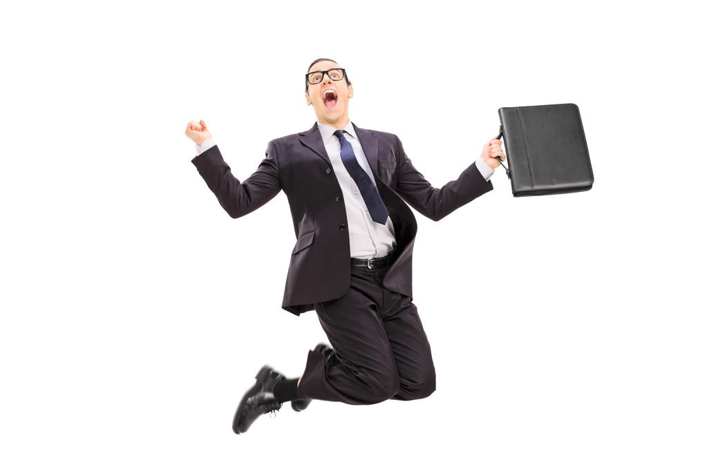 Businessman with briefcase jumping - Photo, Image