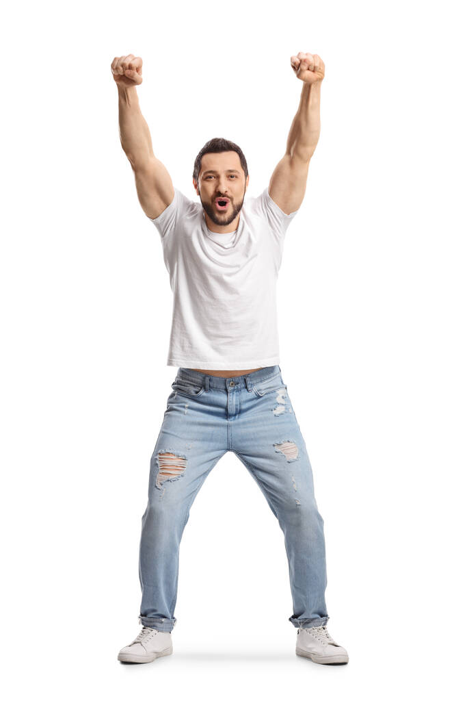 Full length portrait of a young man cheering isolated on white background - Φωτογραφία, εικόνα