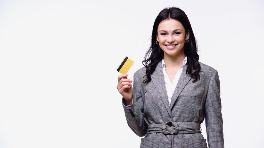 Νέος διευθυντής με σακάκι που κρατά πιστωτική κάρτα που απομονώνονται σε λευκό  - Φωτογραφία, εικόνα