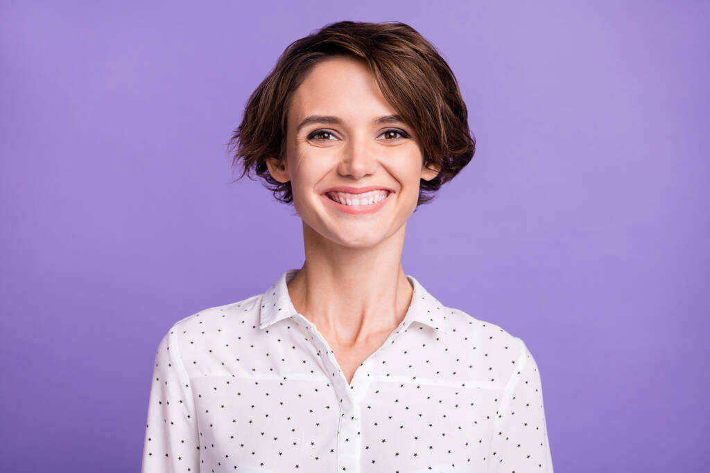 Close-up portrait of attractive cheerful brown-haired girl manager isolated over violet purple color background - Photo, Image